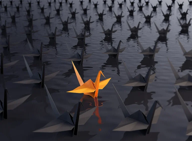 Senior executive in reflective leadership conversation — personality traits effective leaders